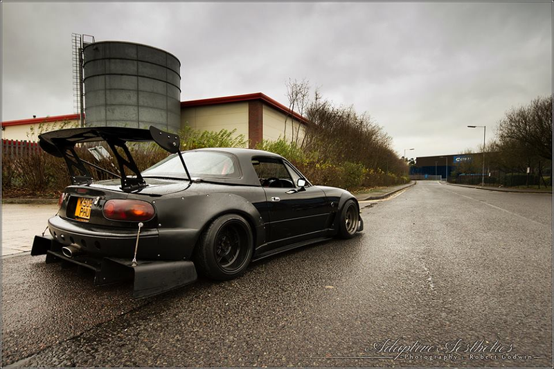 This Miata with absurd wing. Also hilarious because this picture looks totally serious.